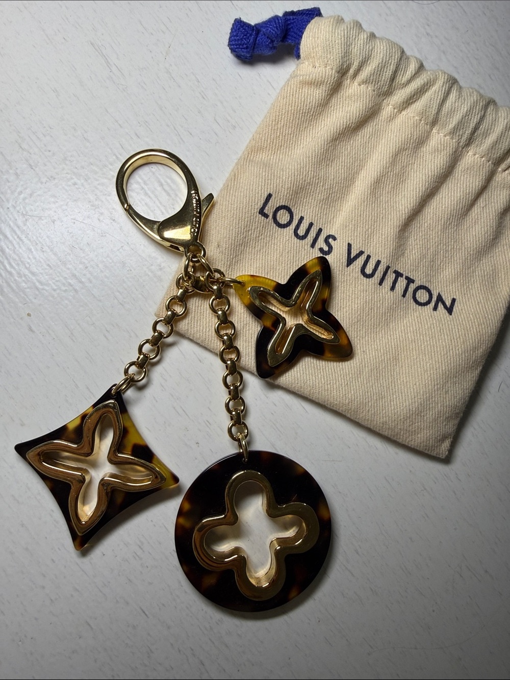 Louis Vuitton Tortoiseshell Monogram Key & Charm in Gold-Tone Hardware